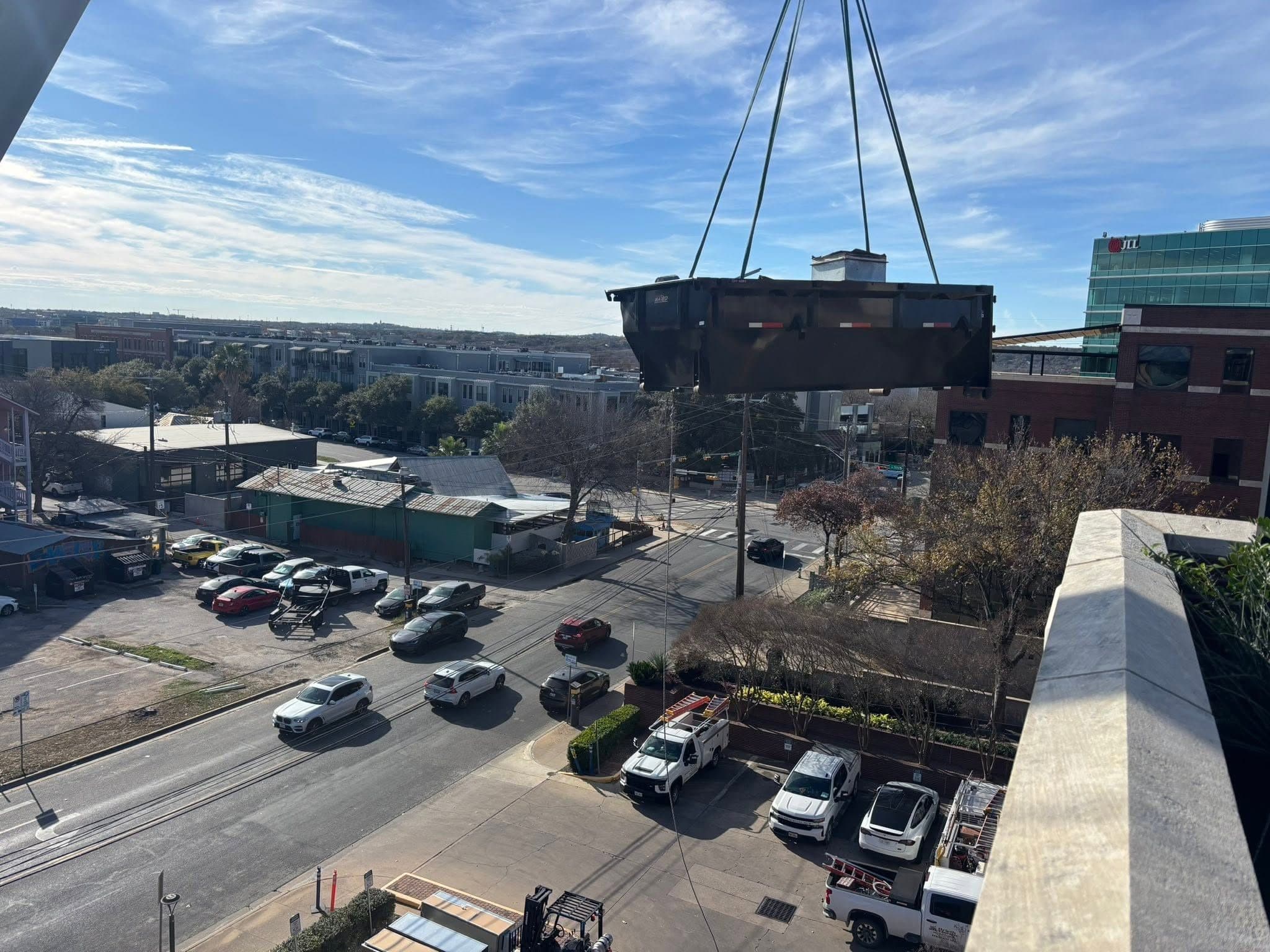 Mechanical equipment suspended from crane rigging